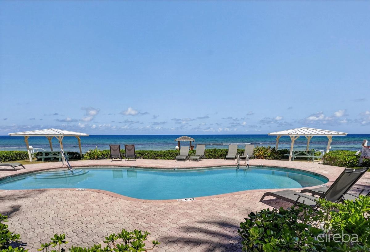 2 Bedroom End Unit with Beachfront Views in Northern Lights, Grand Cayman — photo 2
