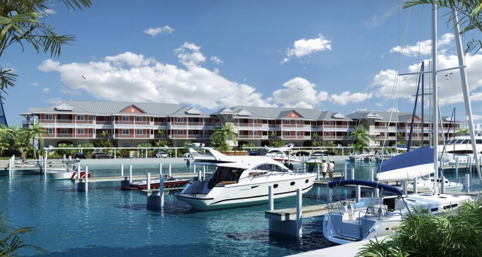 Freehold - Enjoy the view out to the pool, beach area, and across the wide open panorama of the North Sound from your covered balcony. — photo 4