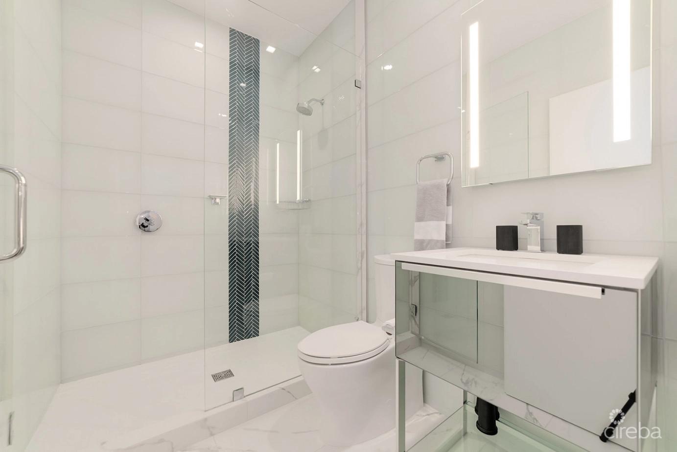 Fin- Chic 4 Bed W Den Condo in the Cayman Islands — photo 5