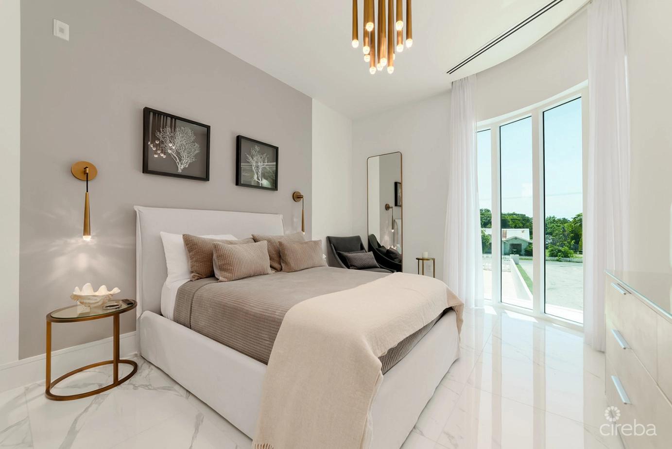Fin- Chic 4 Bed W Den Condo in the Cayman Islands — photo 2