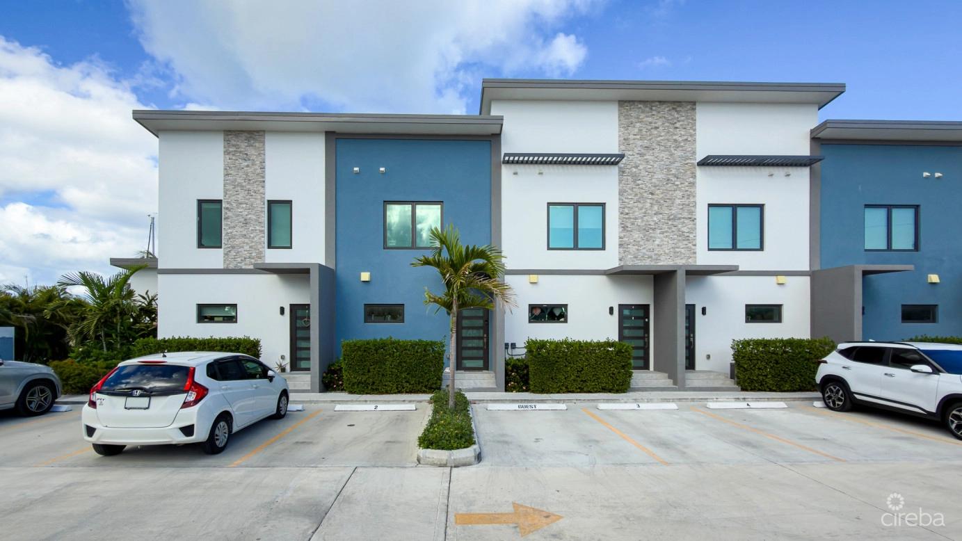 Canal Front Large 2 Bed 2.5 Bath Townhome In Omega Bay With Dock Space — photo 2