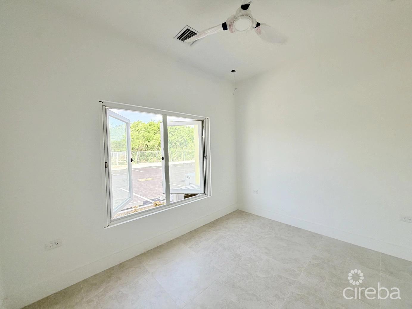 1 bedroom property for sale — Large One Bedroom Townhome - The Meadows At Batabano — photo 4