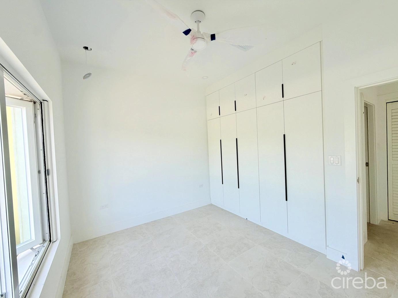 1 bedroom property for sale — Large One Bedroom Townhome - The Meadows At Batabano — photo 5