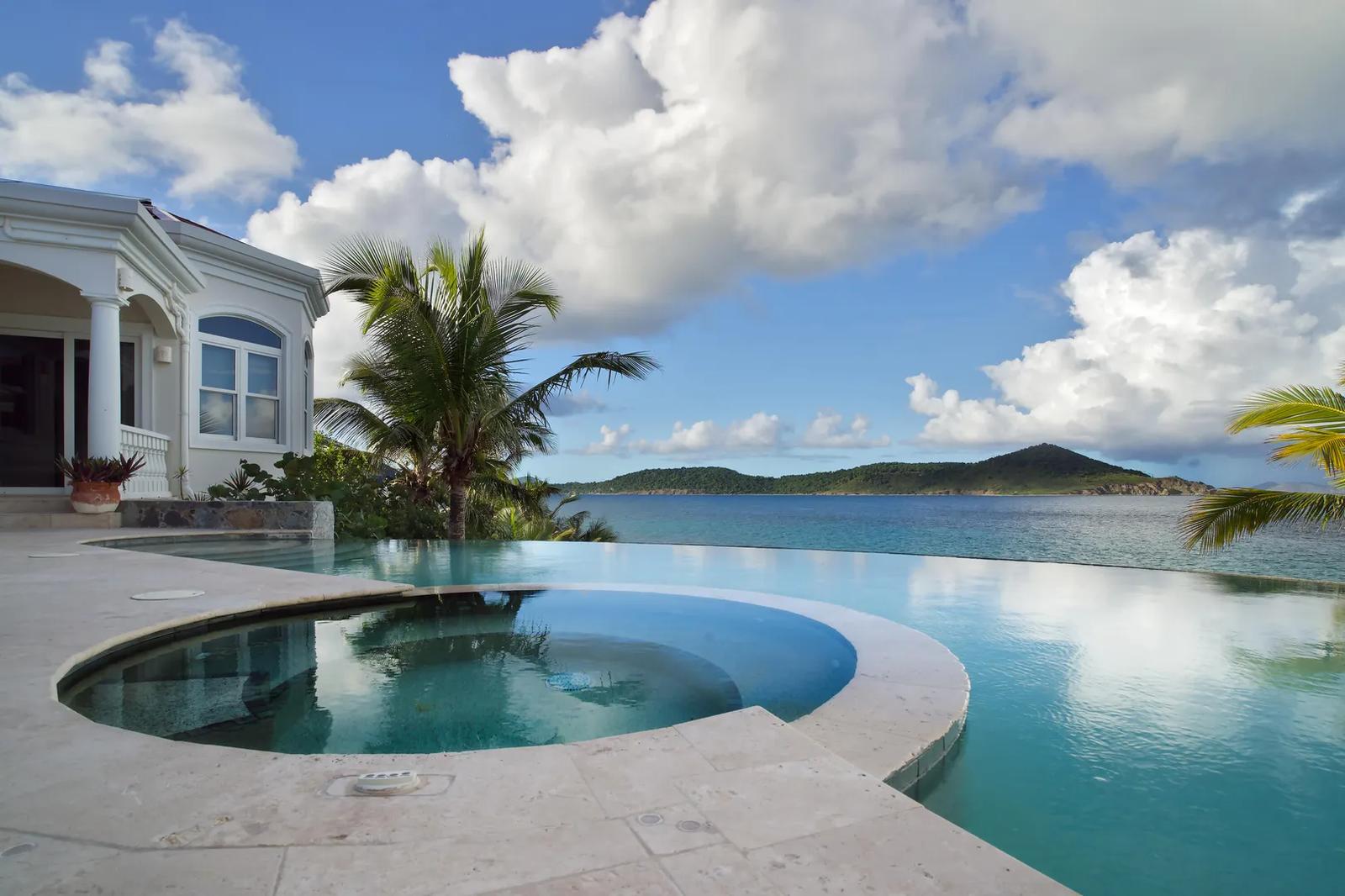 Waterfront Estate with Private Pool and Ocean Views in Smith Bay — photo 1