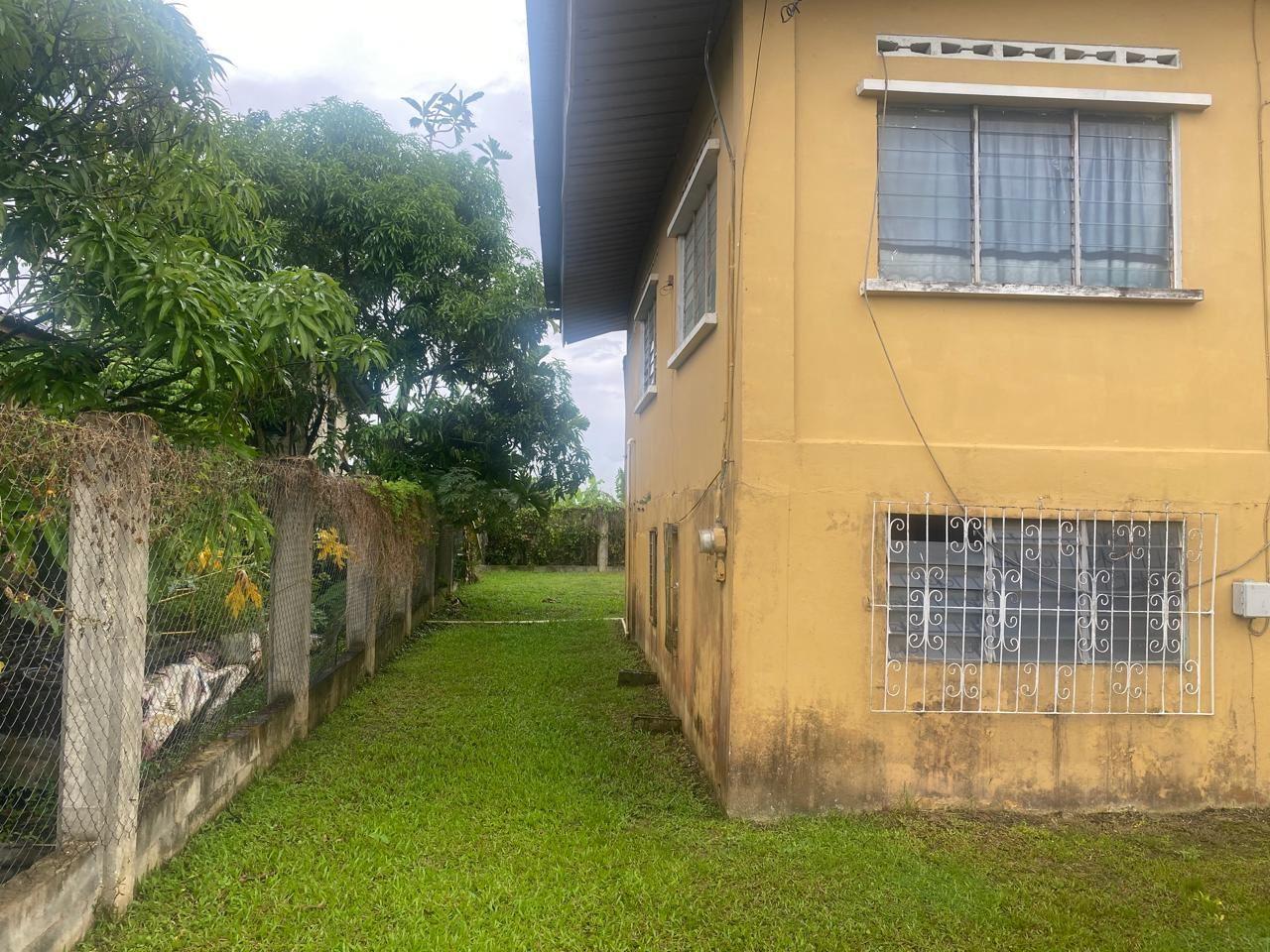 Prime Commercial Land with Free Fixer Upper Structures – Kelly Village, Trinidad — photo 3