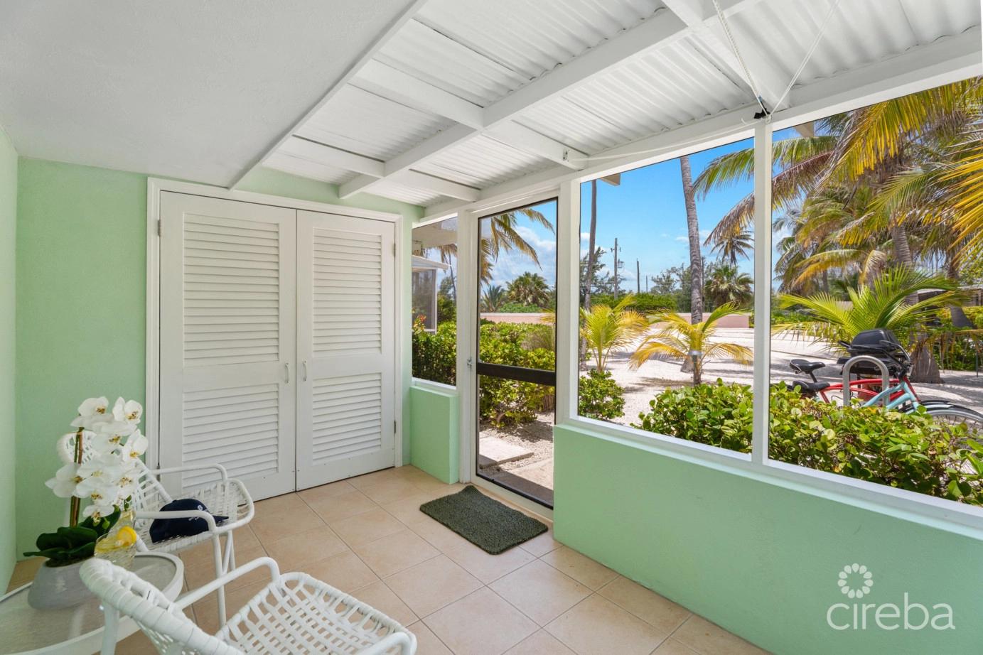 Cayman Kai Sea Lodge #13 Beachfront Condo With Impressive Rental History — photo 5