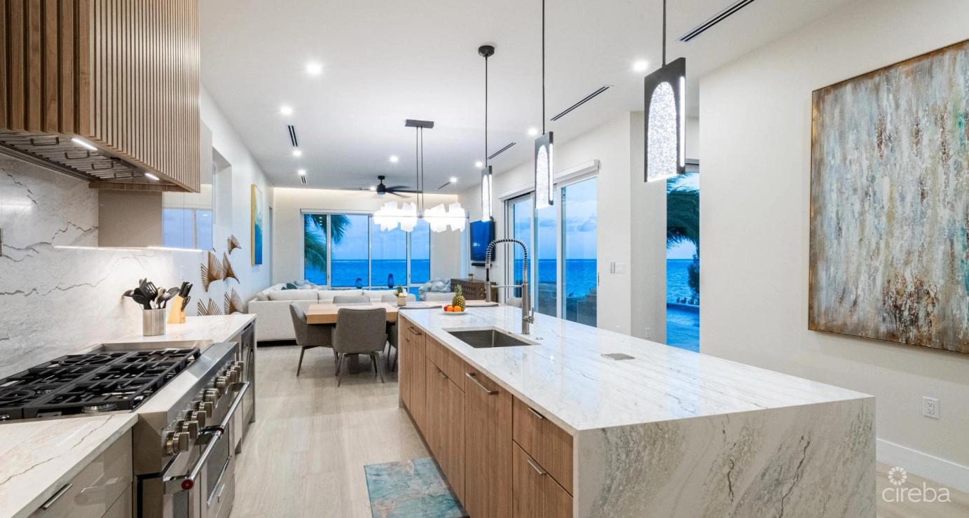Stunning Seaside Sandy Beach Villa In East End — photo 2