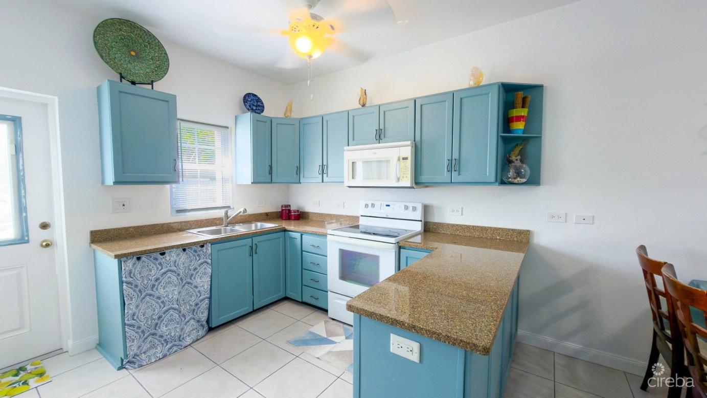 2 bedroom property for sale — Shoreway Townhomes #24 in the Cayman Islands — photo 2