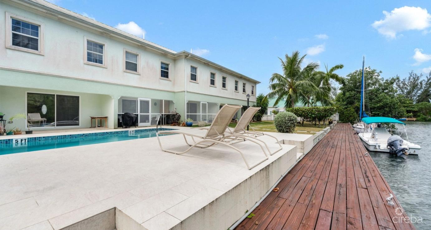 Canal Front Large 2 Bed 2.5 Bath Townhome In Omega Bay With Dock Space — photo 3