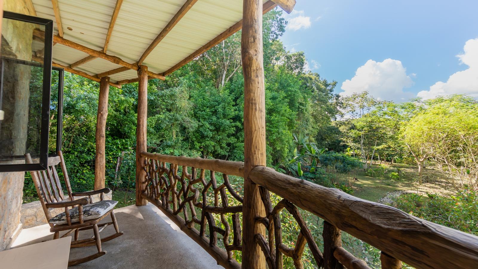 Spectacular Off-Grid Mayan Retreat with Two Stone Buildings, 2 Acres of Land, and Pond near San Ignacio Town — photo 2