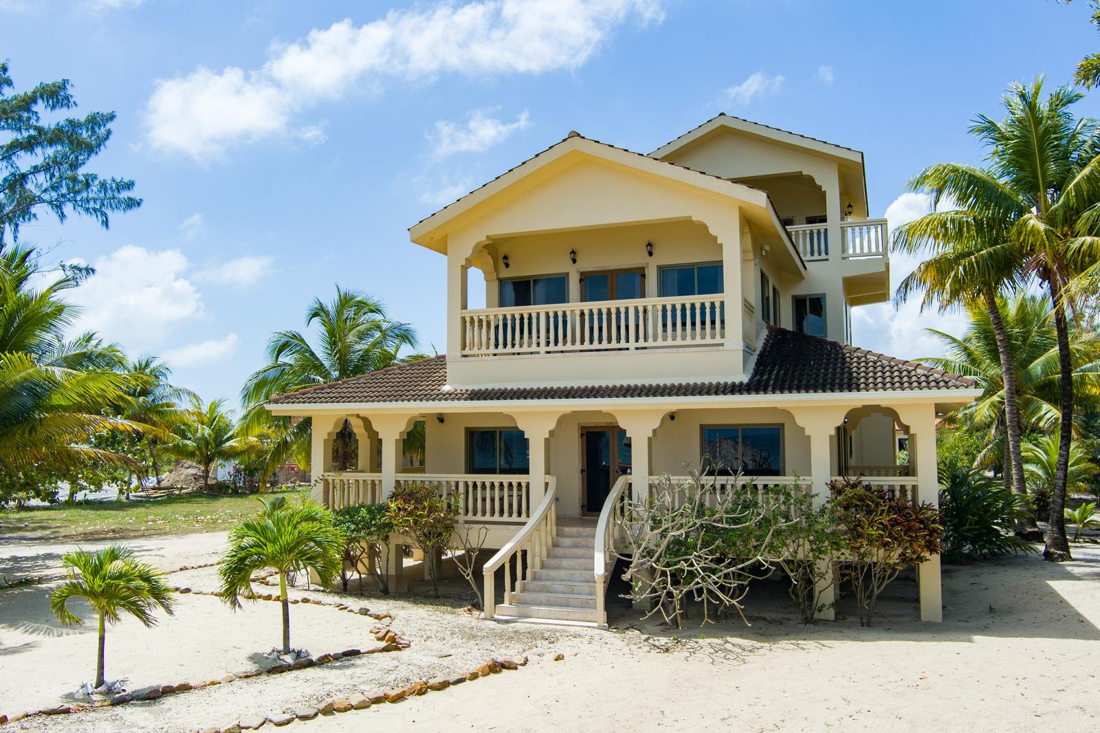 Idyllic Beach Estate with Pier and Staff Quarters — photo 1