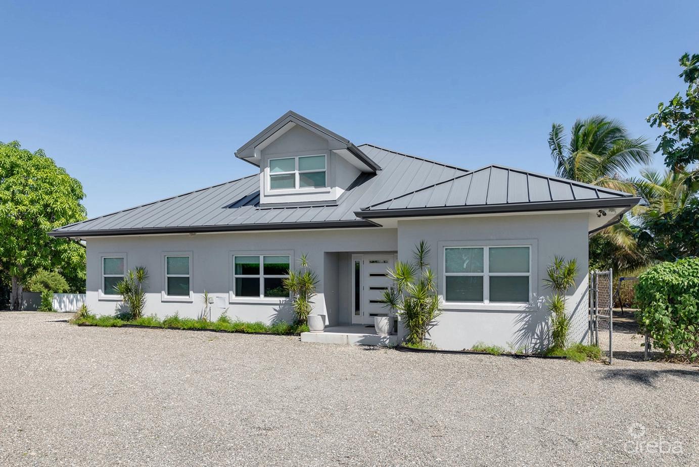 Elevated, 6-bedroom Single Family Home On A Massive Parcel in Bodden Town — photo 1